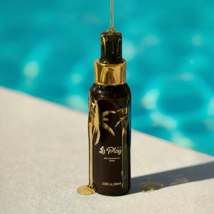 Black and gold bottle with palm tree design on a poolside background